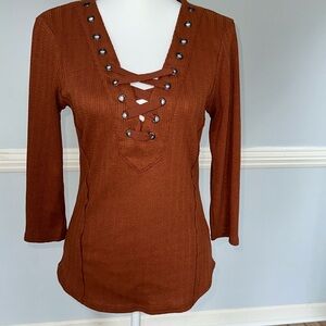 Buckle Gimmick brand burnt orange fitted long sleeve top